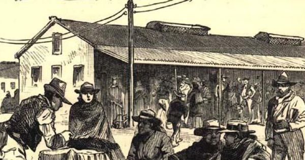 Vendedores de queques y frutas en las afueras de la pulpería