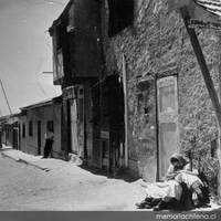 Calle y mujer, hacia 1960