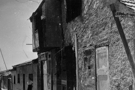 Calle y mujer, hacia 1960