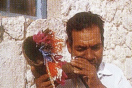 Tocador de putu, Peine, II Región, ca. 1998